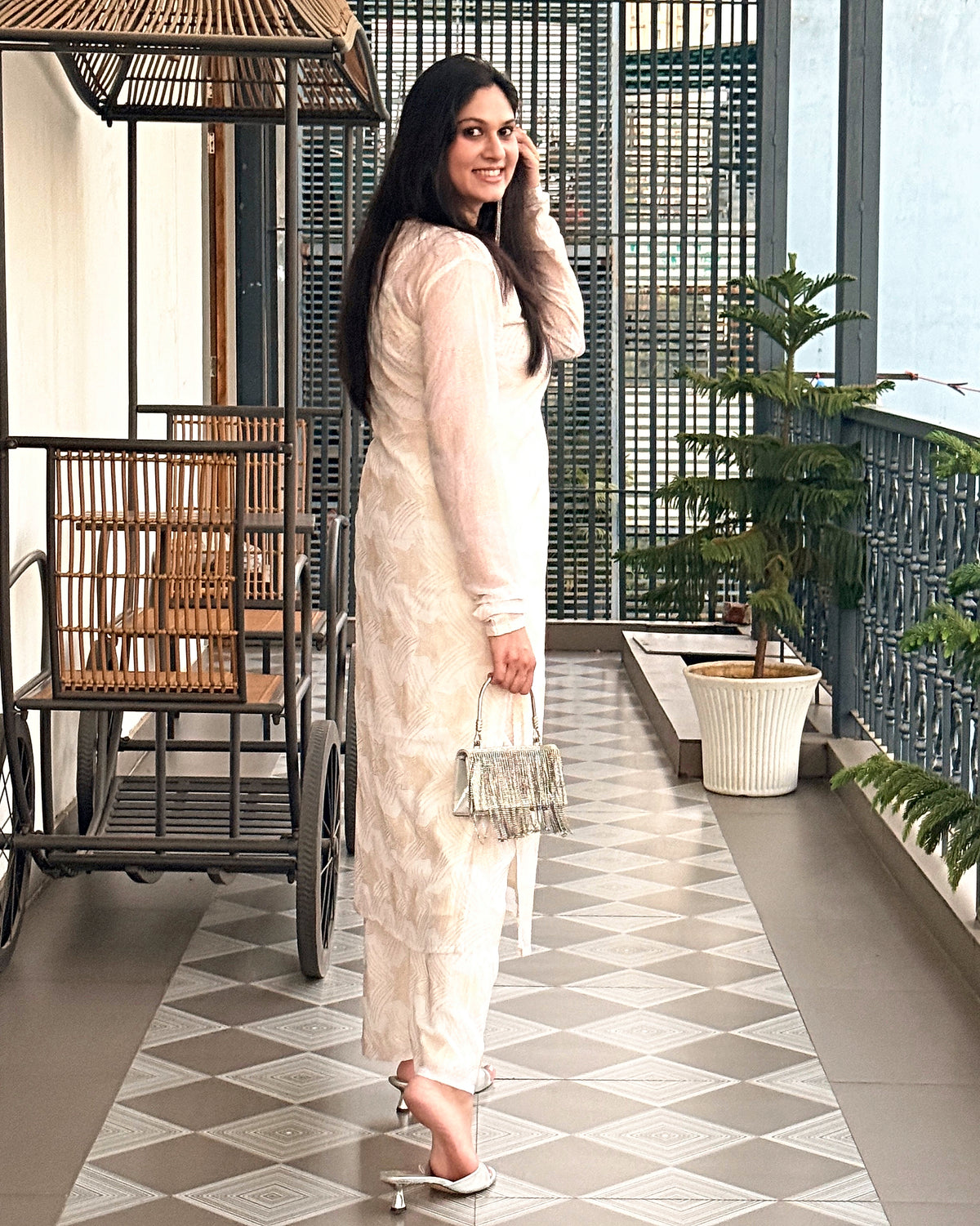 Chandni Noor ivory kurta set, side view