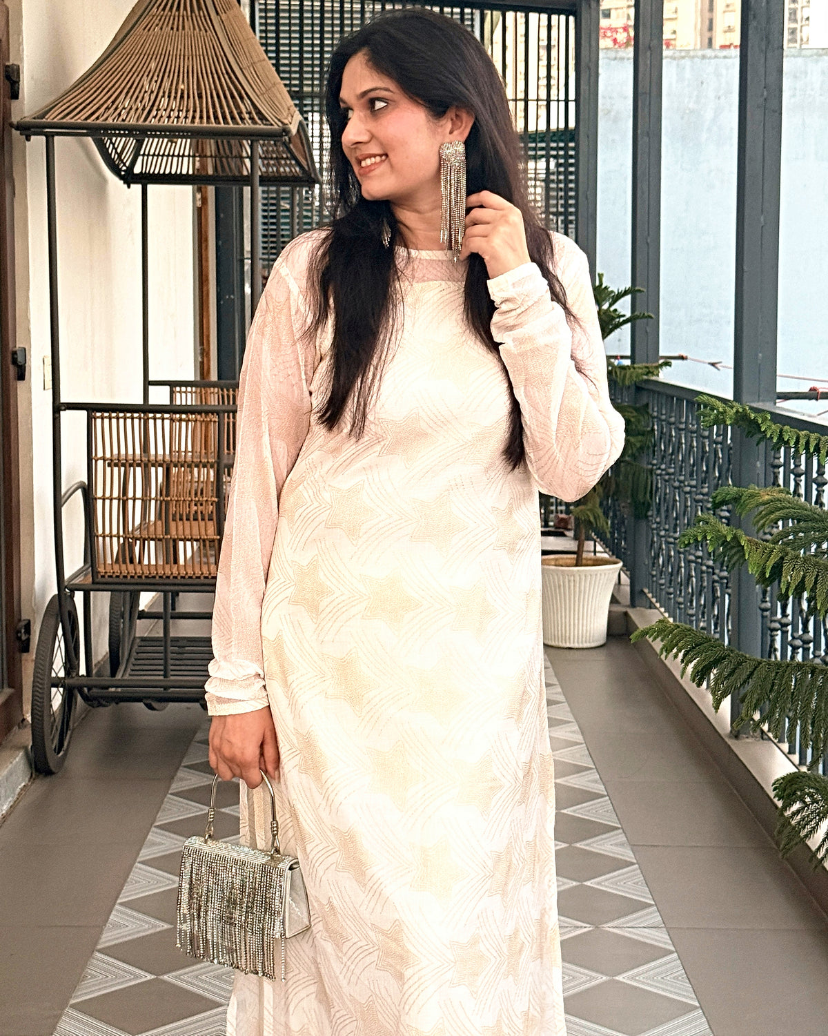 Chandni Noor ivory chiffon kurta set, front three-quarter view